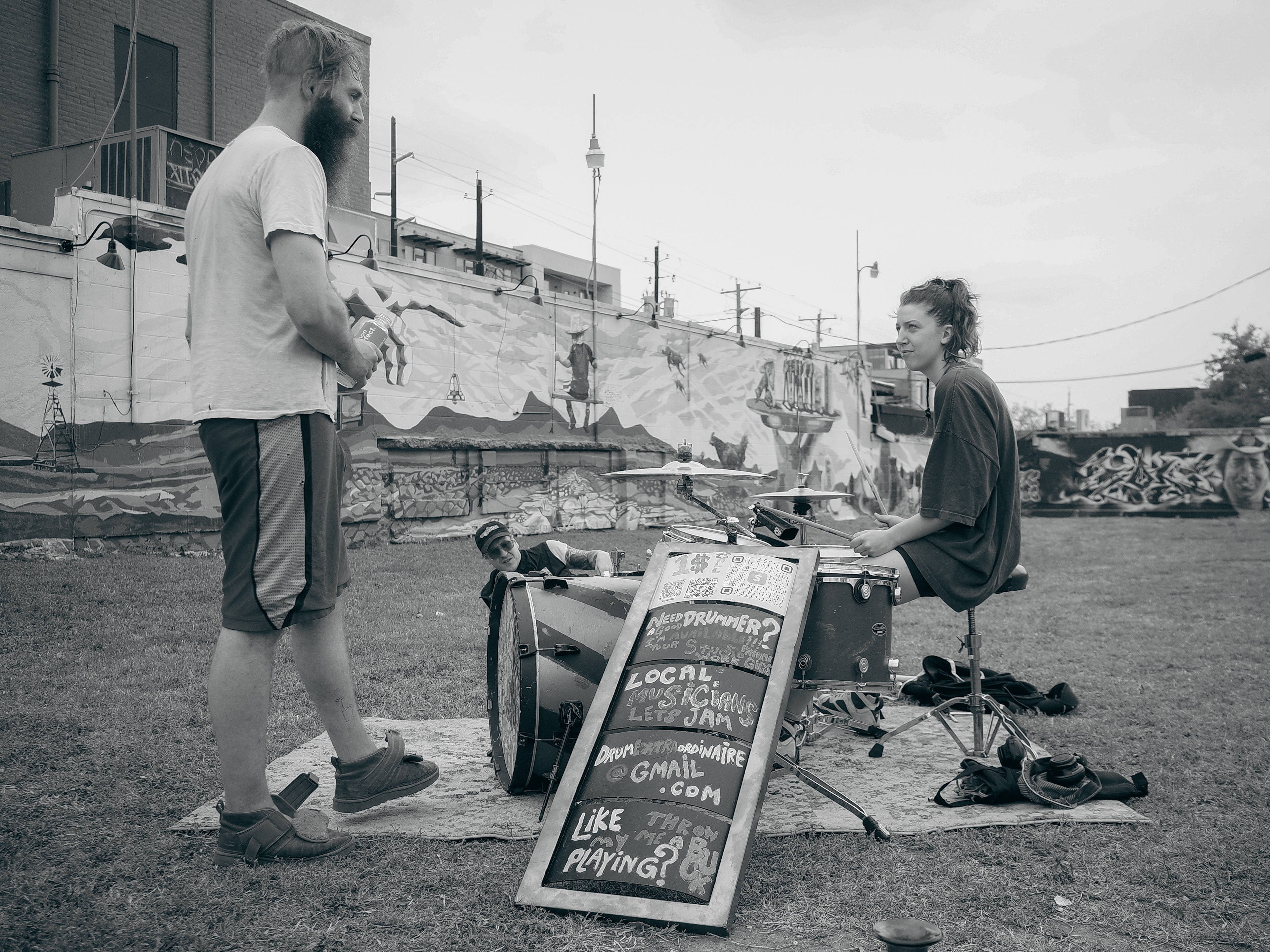 a random drummer in an empty lot